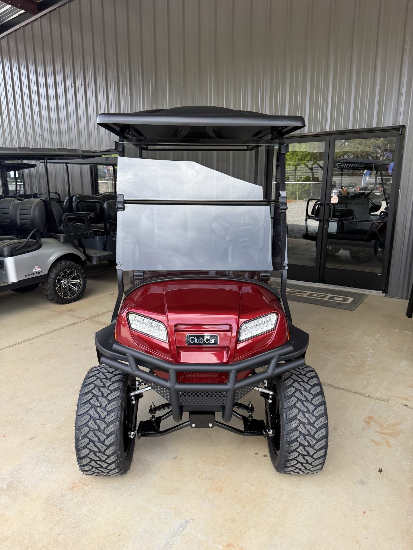 2027 Club Car Onward Lifted 4-Passenger Gas Golf Cart | Red - Image 2